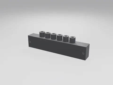 Black 3D printed rectangular manifold block with a row of round outlet sockets on top and screw holes at the ends
