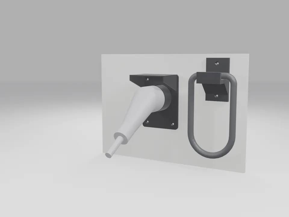 Black holster on a plain wall holding a generic grey plug stand-in by its nose, with a black cable coil hanging on the dock beside it