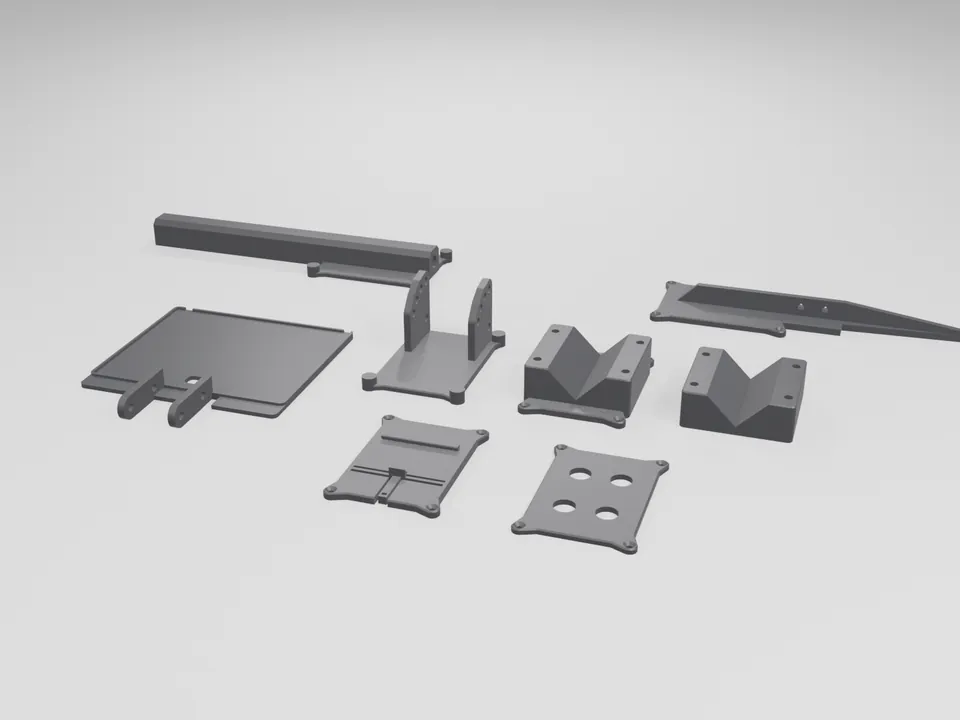 The farm-IoT accessory kit in black ASA laid out flat: antenna mast, solar-panel tray with hinge lugs, solar bracket base with two ears, pole clamp back and jaw with V-shaped jaws, DIN-rail plate, gland lid with four holes and the ground stake
