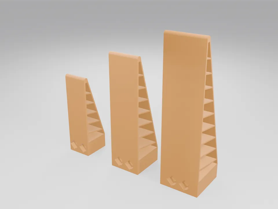 Three orange 3D printed TPU soft gripper fingers in egg, fruit and bottle sizes, each with tilted internal ribs and two M3 mounting holes