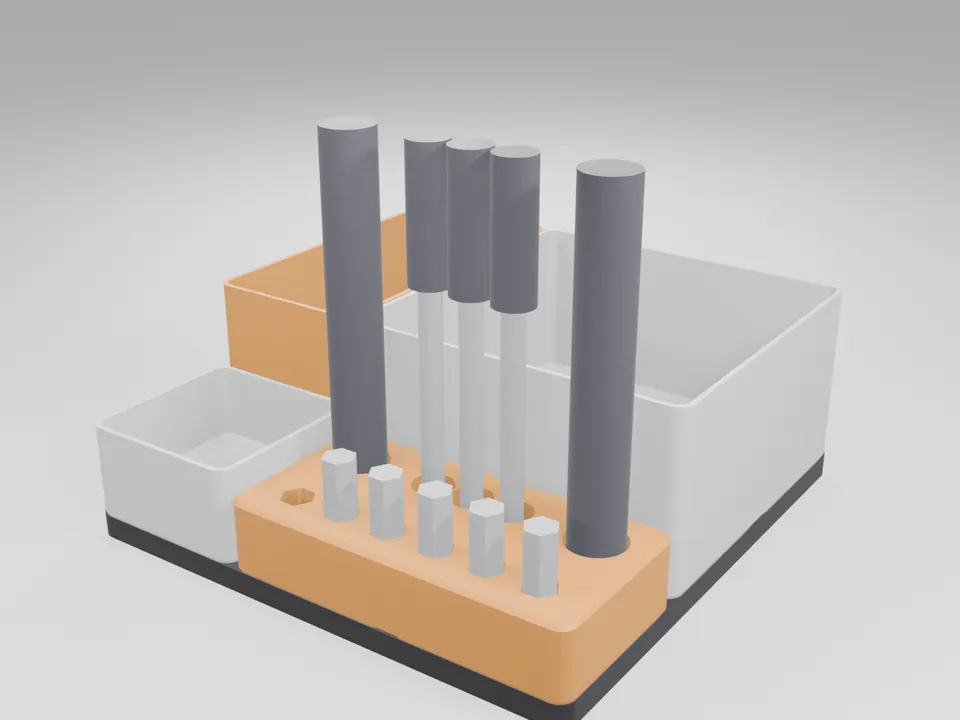 3D printed organiser set holding grey screwdriver handles and hex bits in the orange tool block