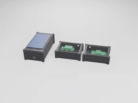 Three black 3D printed node cases: a long closed case with a blue solar panel in its lid frame, and two open boxes with plain green board stand-ins inside