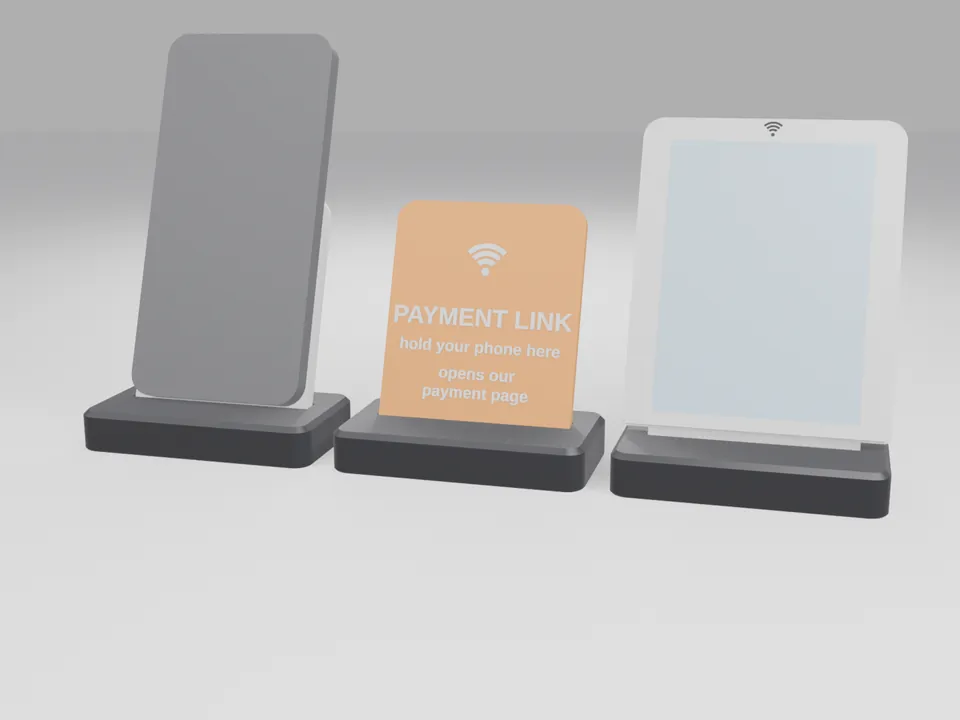 The three NFC counter stands in use: a plain grey phone-sized block resting on the tap-to-follow plate, the orange payment-link stand, and a plain pale blue card in the display holder