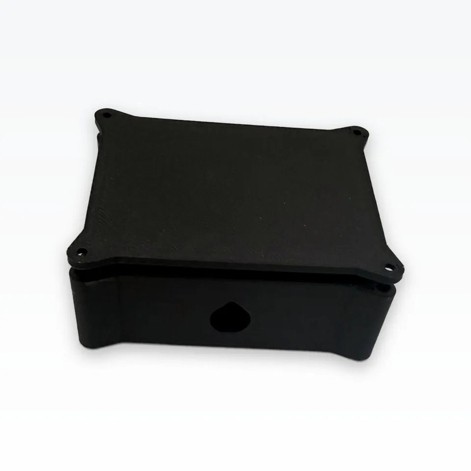 Black 3D-printed outdoor case for a LoRa mesh node with a solar lid, printed by Formada3D