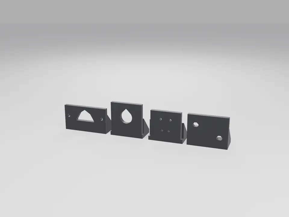 Four grey 3D printed sensor brackets in a row, each with a slotted base and an upright plate with a different hole pattern