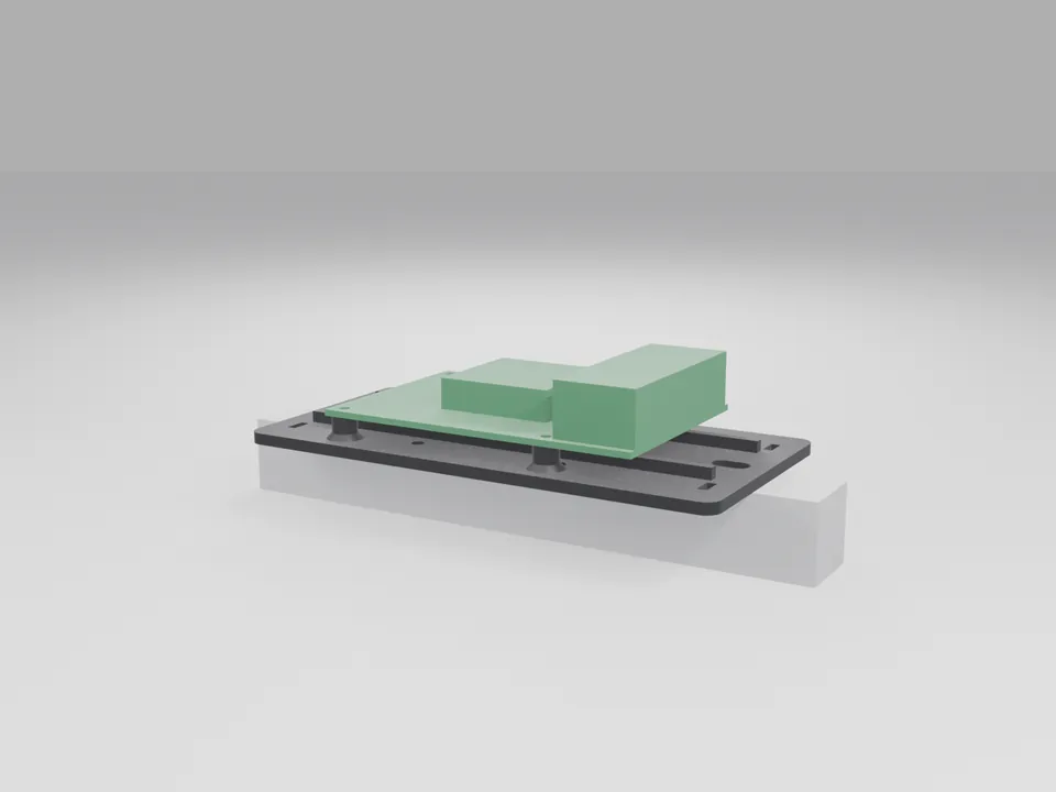 A plain green board stand-in with block components sitting on the black deck mount, which is bolted to a white 2020 extrusion stub