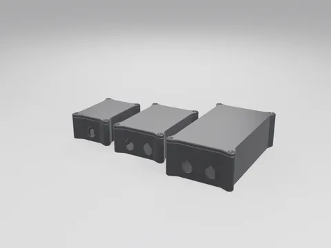 Three black 3D printed sealed enclosures in small, medium and large sizes with screw-down lids and round cable-gland ports