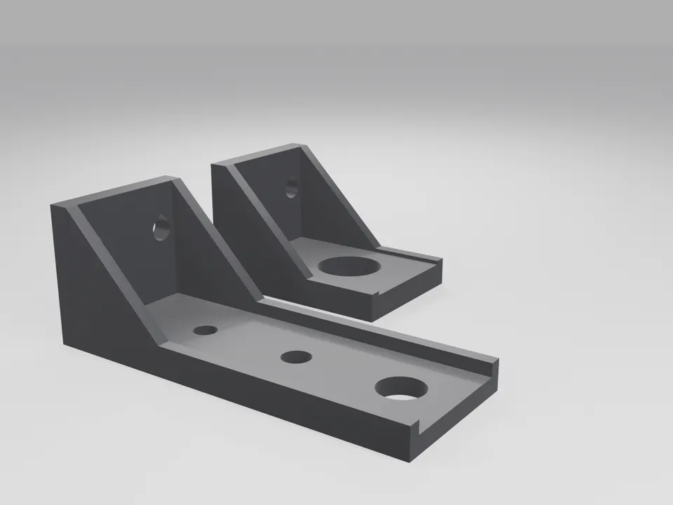 Two grey 3D printed L-shaped suction-cup arms with ribbed edges and clearance holes for cup stems