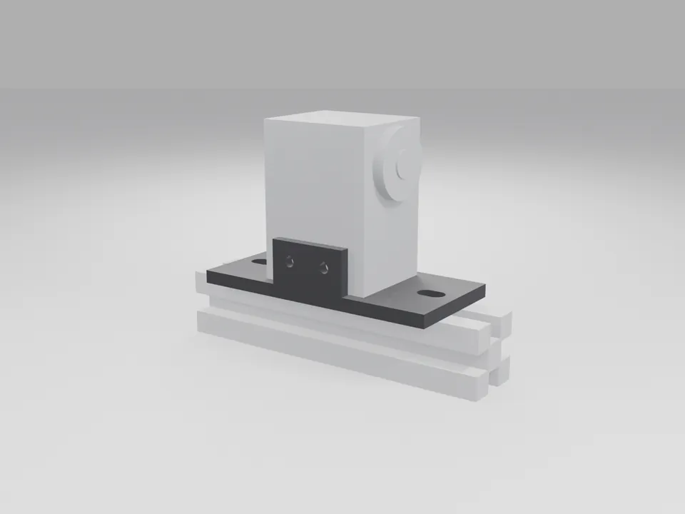 A plain grey servo-sized block standing between the two cheeks of the black base on a grey aluminium extrusion
