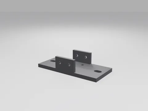Black 3D printed flat base plate with four small holes in the middle, two upright side cheeks with two holes each, and slots at both ends